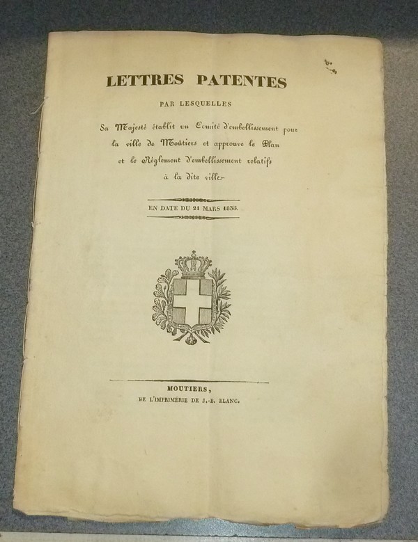 Lettres Patentes par lesquelles sa Majesté établit un comité d'embellissement pour la Ville de Moutiers et approuve le PLan et Règlement relatifs à...