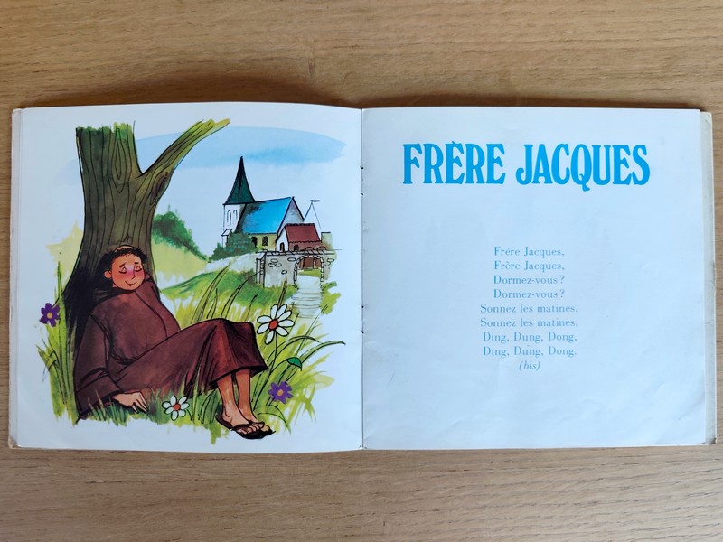 Am Stram Gram, volume 5. Une poule sur un mur - Gentil coquelicot - Marie Madeleine - Frère Jacques - Bleu, bleu, bleu, la bouteille est bleue - Ah mon beau château - Petit Papa c'est aujourd'hui ta fête - Bon voyage M. Dumollet