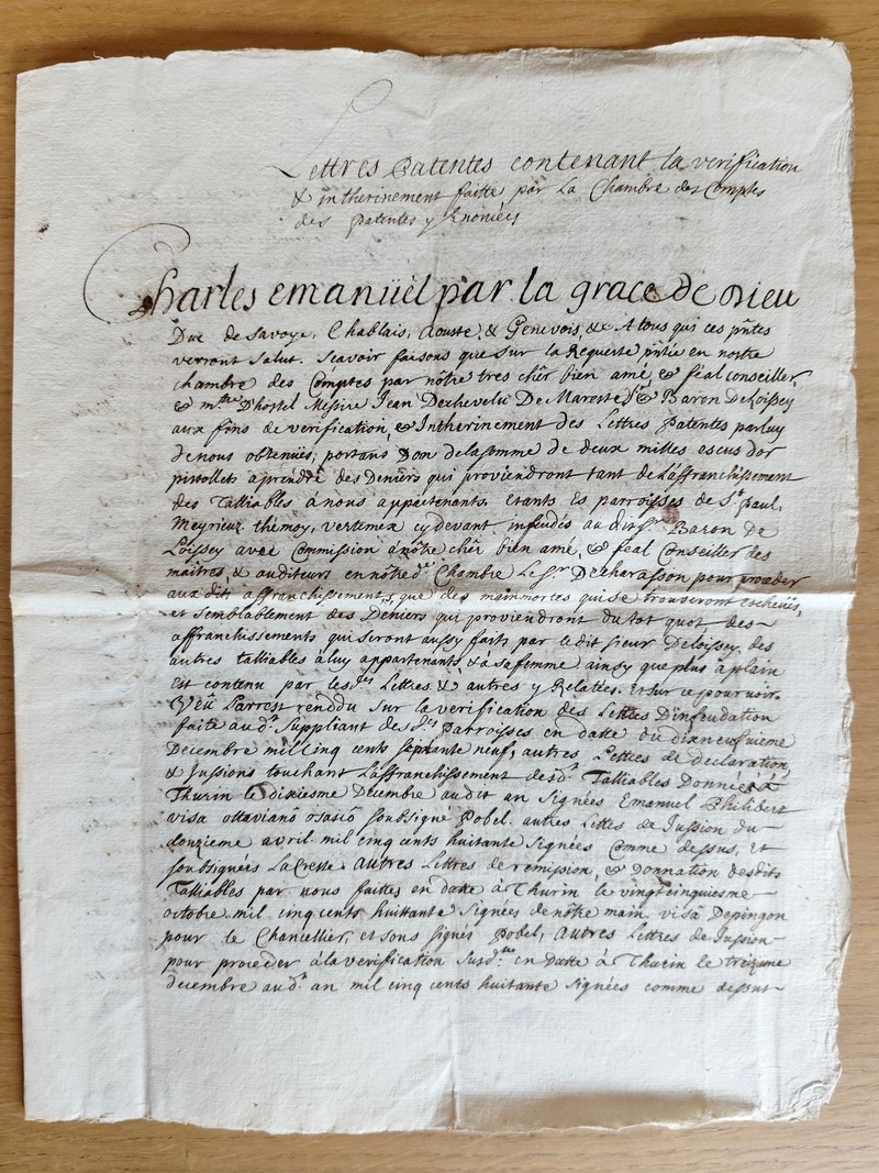 Extrait d'une lettre patente de Charles Emmanuel Ier en date de juillet 1720, pour un acte de 1581 concernant le don de 2000 écus provenant de...